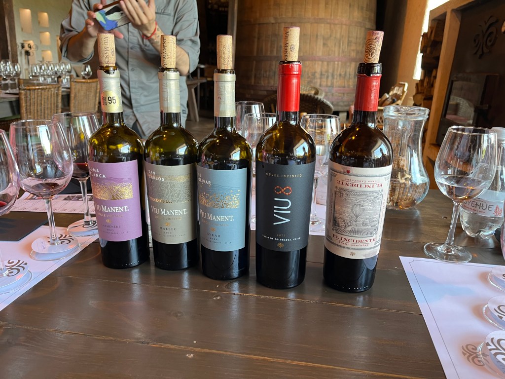 Bottles of wine on the tasting table at Viu Manent winery Colchagua Valley Chile