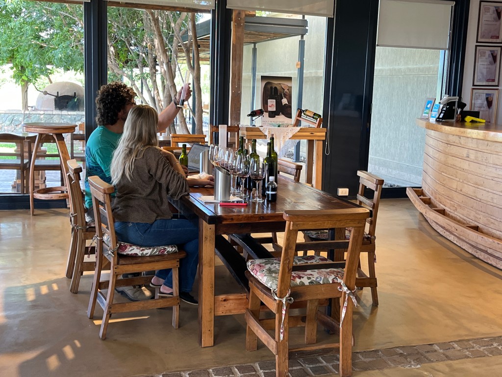 Checking on the wine Caelum Winery Uco Valley Argentina